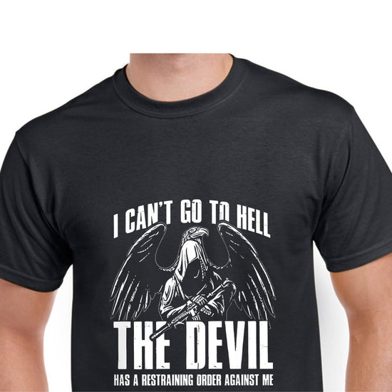 Winged hooded figure holding a gun, with the text &